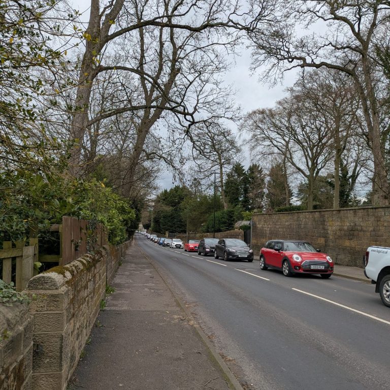 A long line of queuing cars at commuting time in Leeds.